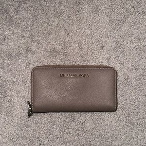 Michael Kora wallet